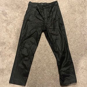 Express stretch coated black super high rise straight jeans.